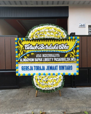 Papan Bunga Duka di Parhorasan Nauli
